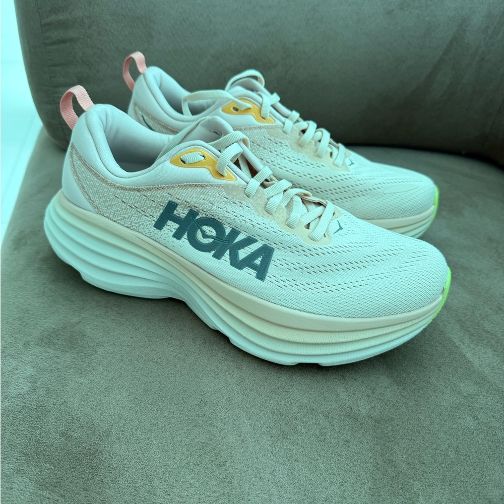 Bondi 8 Hoka Cream Athletic Shoes with Breathable Mesh and Chunky Midsole.